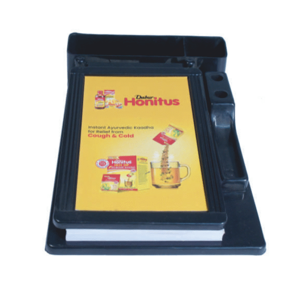 Plastic Promotional Multipurpose Clip Board Cum Pen stand ” Honitus “